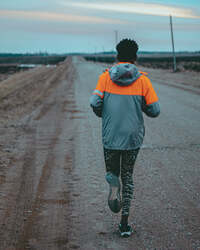 running on a dirt road training for that 1.6k in 7 minutes