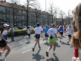 runners on street in a running race